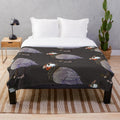 A soft and plush blanket featuring the beautiful helmeted guinea fowl bird design