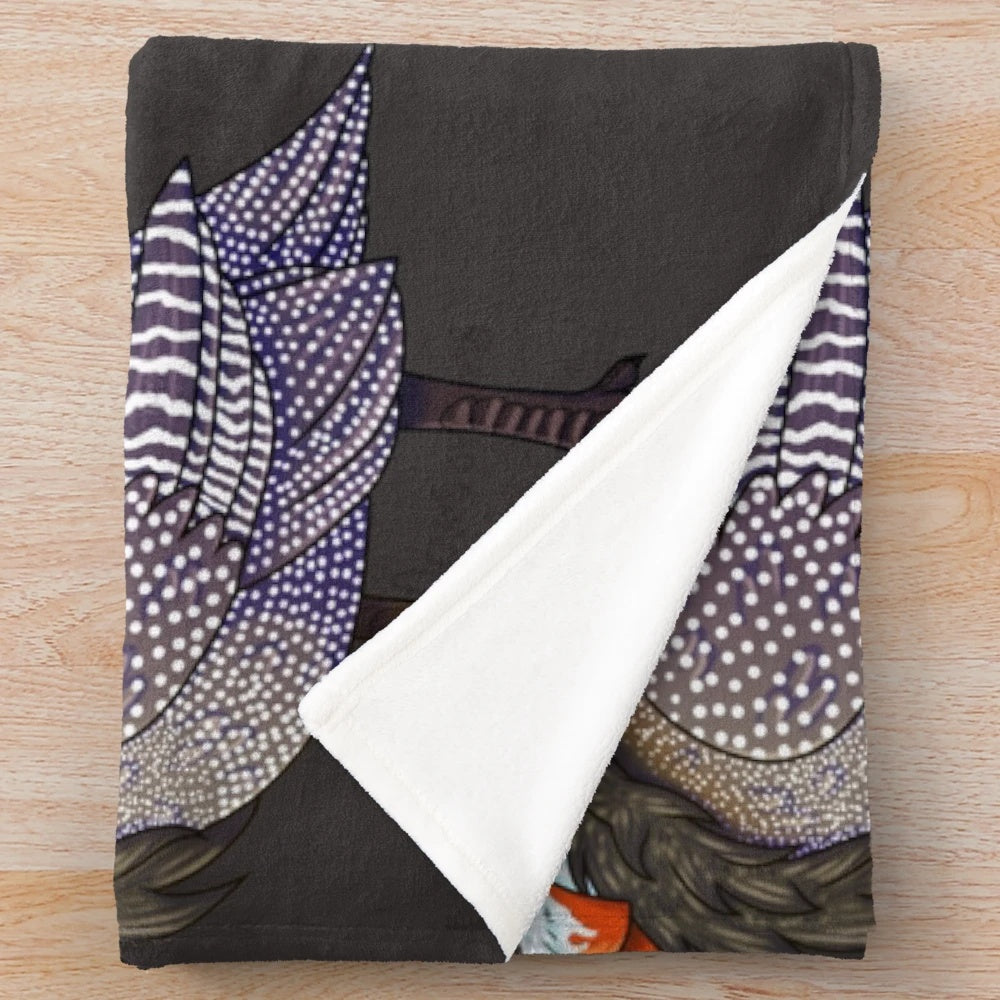 A soft and plush blanket featuring the beautiful helmeted guinea fowl bird design
