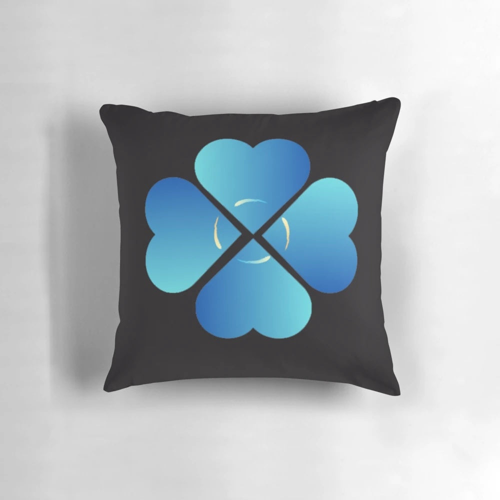 Plush heart-shaped pillow in black and white color with floral design