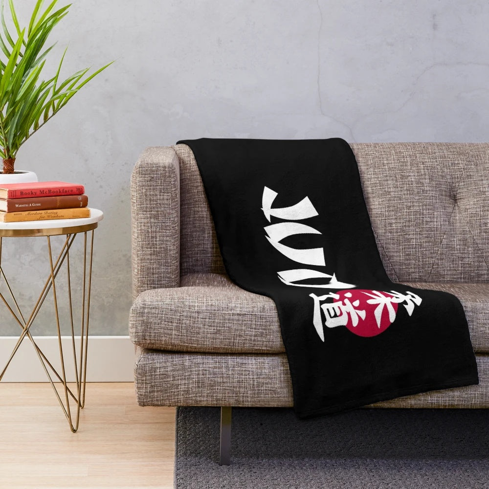 Judo plush blanket with a red and black design