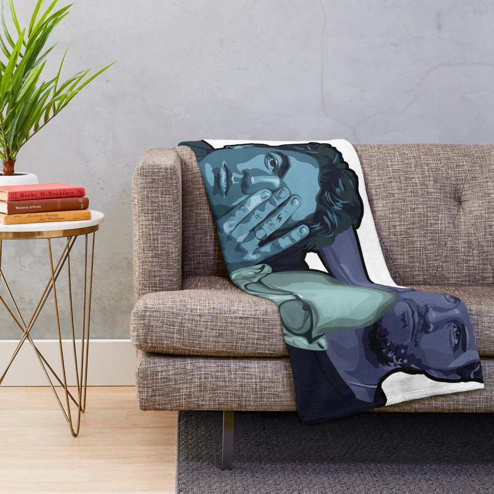 LANY-inspired moon plush blanket in soft blue, green, and turquoise colors
