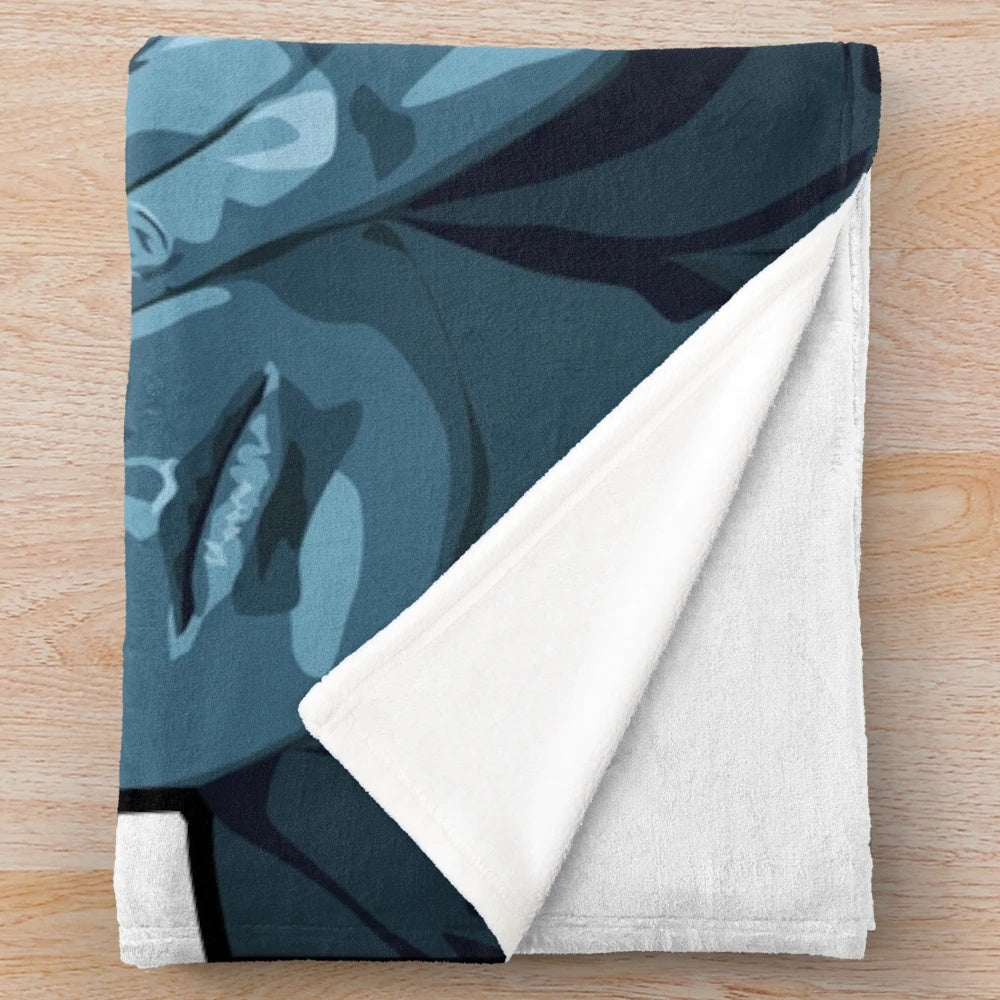 LANY-inspired moon plush blanket in soft blue, green, and turquoise colors
