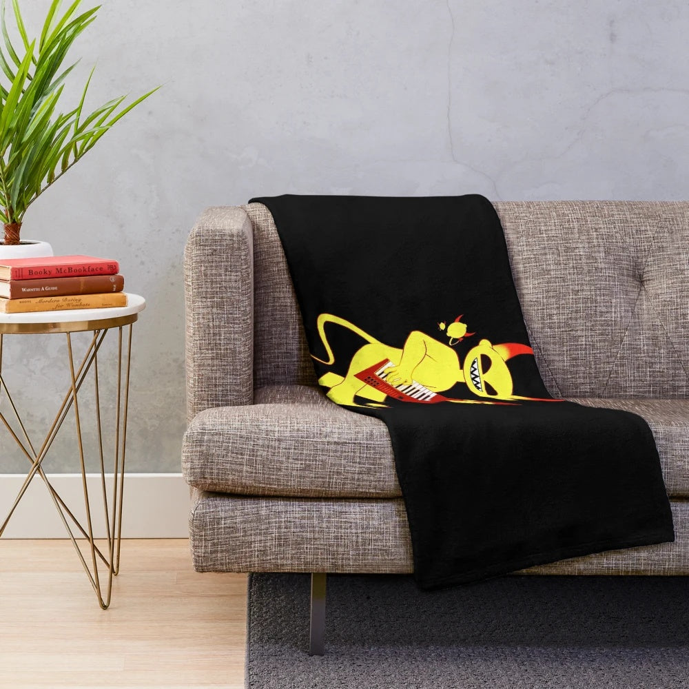 A soft and plush blanket featuring the Lemon Demon logo and design