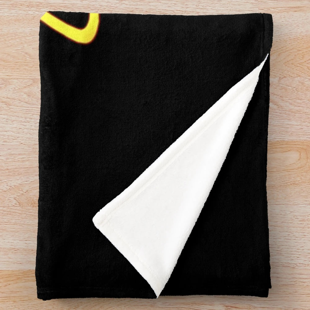 A soft and plush blanket featuring the Lemon Demon logo and design