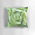 A plush, green lettuce-shaped pillow for comfortable and decorative home accents.