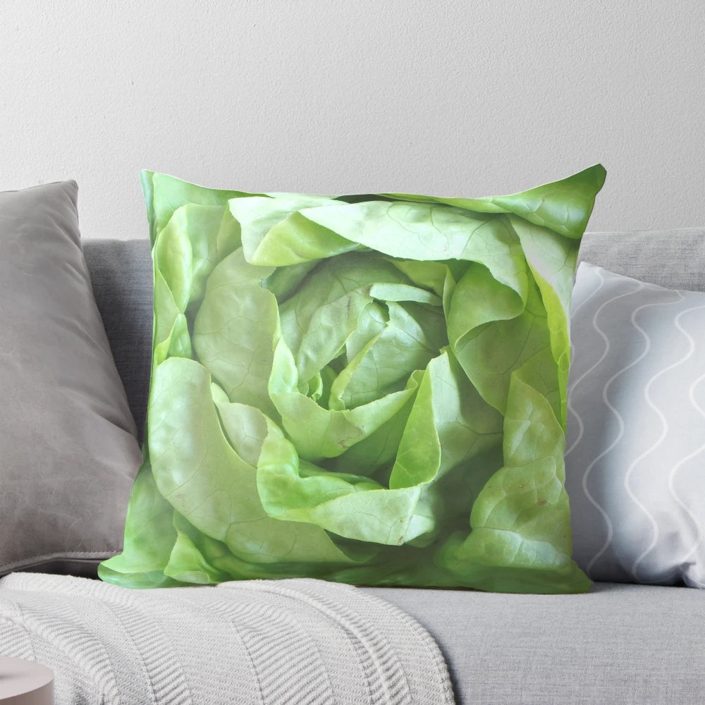 A plush, green lettuce-shaped pillow for comfortable and decorative home accents.