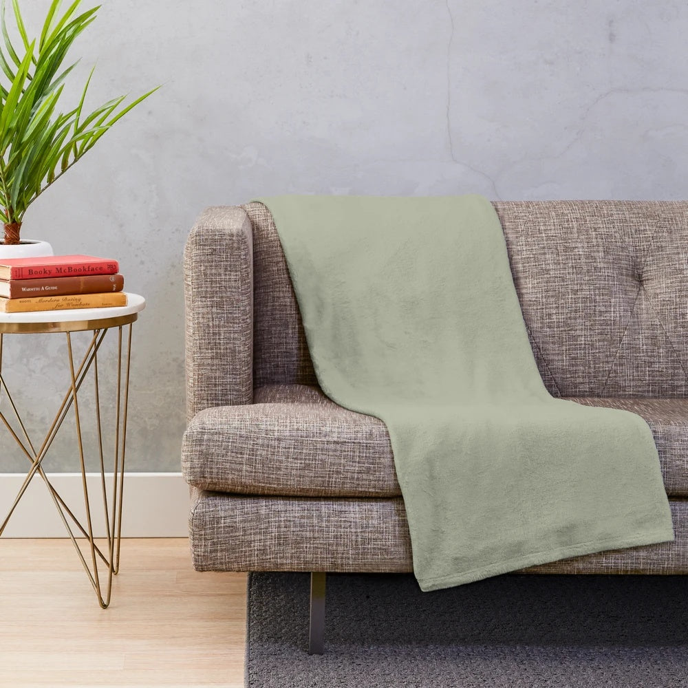 Sage green plush linen blanket for a cozy and relaxing ambiance
