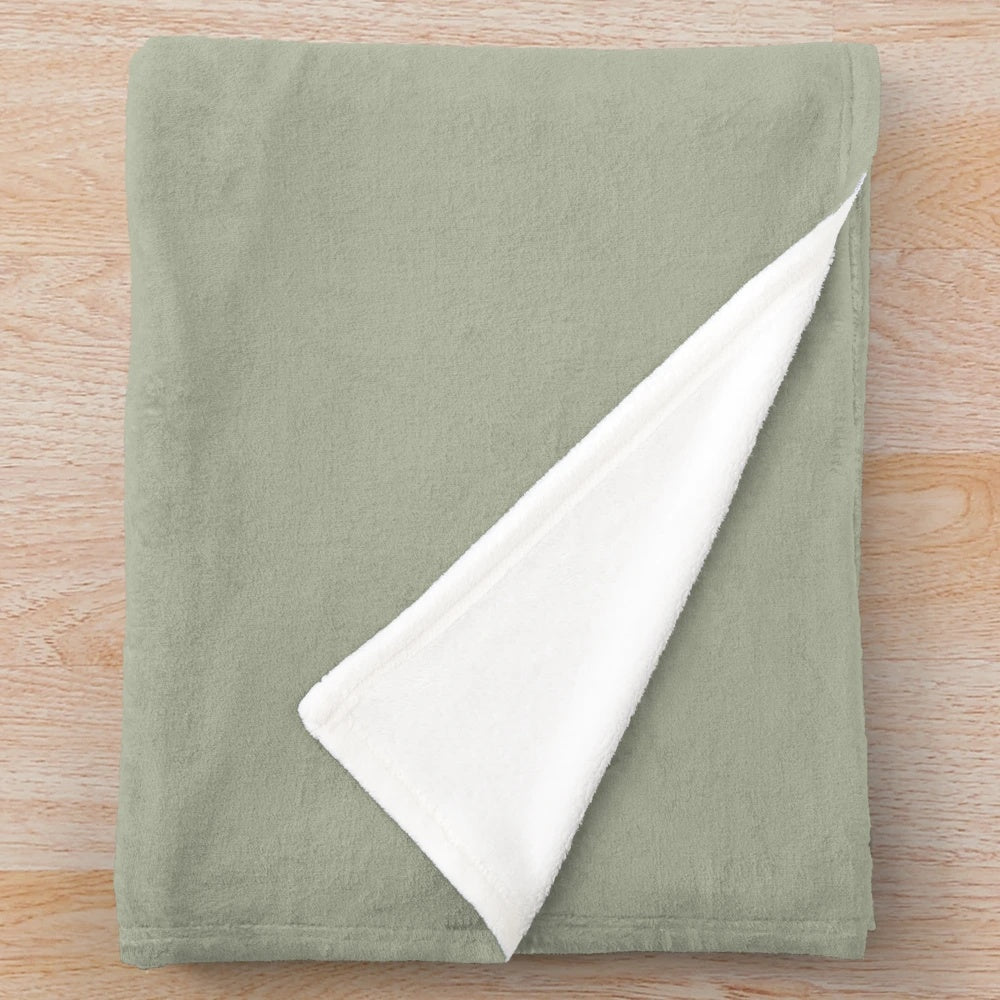 Sage green plush linen blanket for a cozy and relaxing ambiance