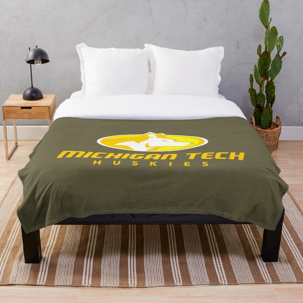 Soft and comfortable plush blanket in Michigan Tech colors