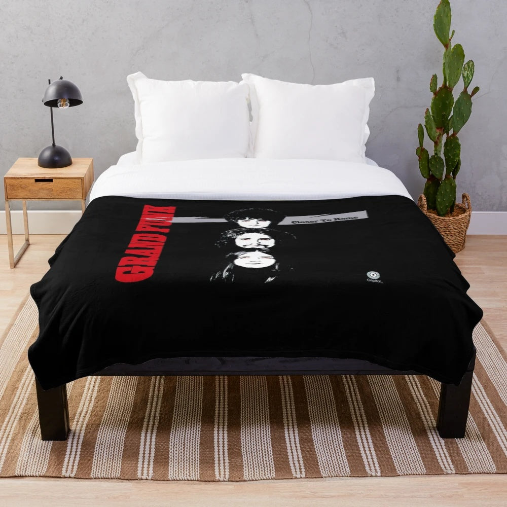 Soft and cozy plush blanket with music-inspired design
