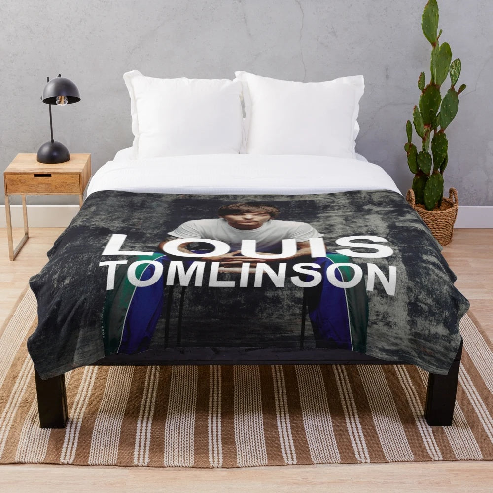 Plush blanket with Endah New Tomlinson Walls inspired design