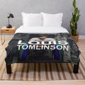 Plush blanket with Endah New Tomlinson Walls inspired design