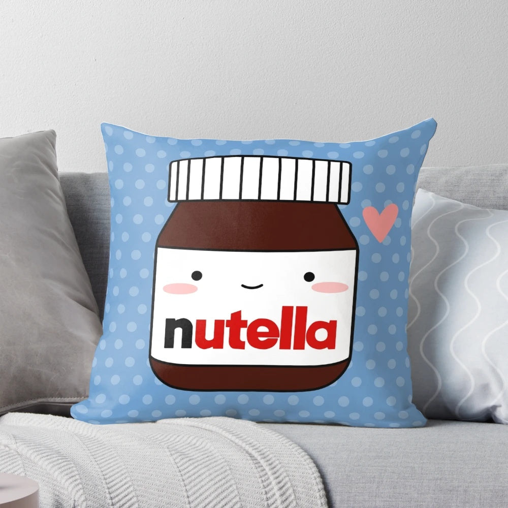 Plush pillow in the shape of a Nutella jar, featuring a chocolatey and hazelnut design.
