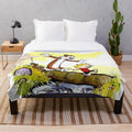 Plush blanket with Calvin and Hobbes cartoon characters