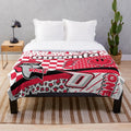 Soft and cozy plush blanket with a variety of trendy patterns and designs