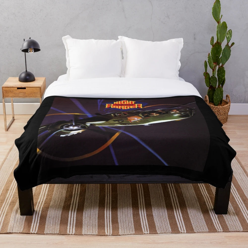 Plush blanket with Night Ranger design