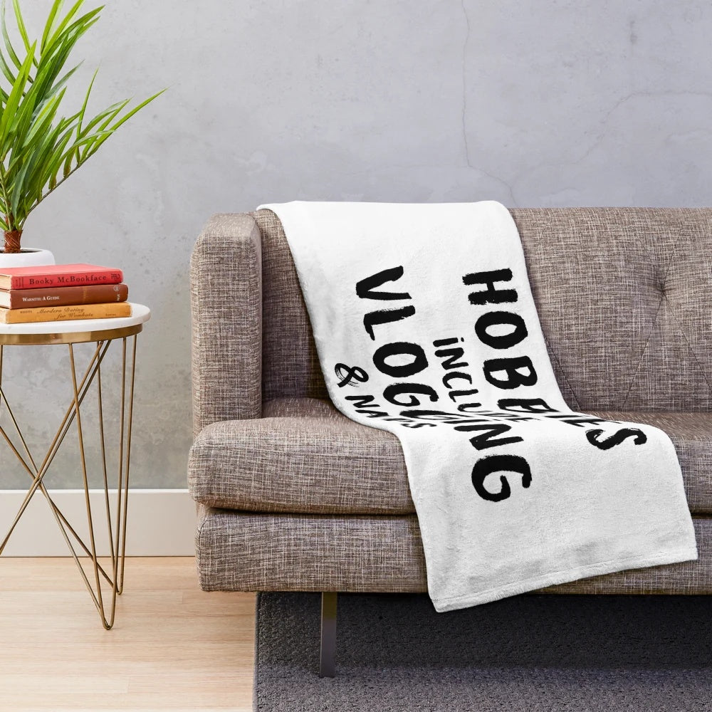 Soft and comfortable plush blanket featuring hobbies like vlogging and napping