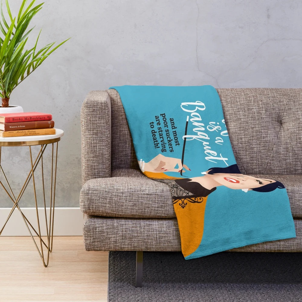 Soft and cozy plush blanket featuring artwork inspired by the classic Hollywood movie Auntie Mame