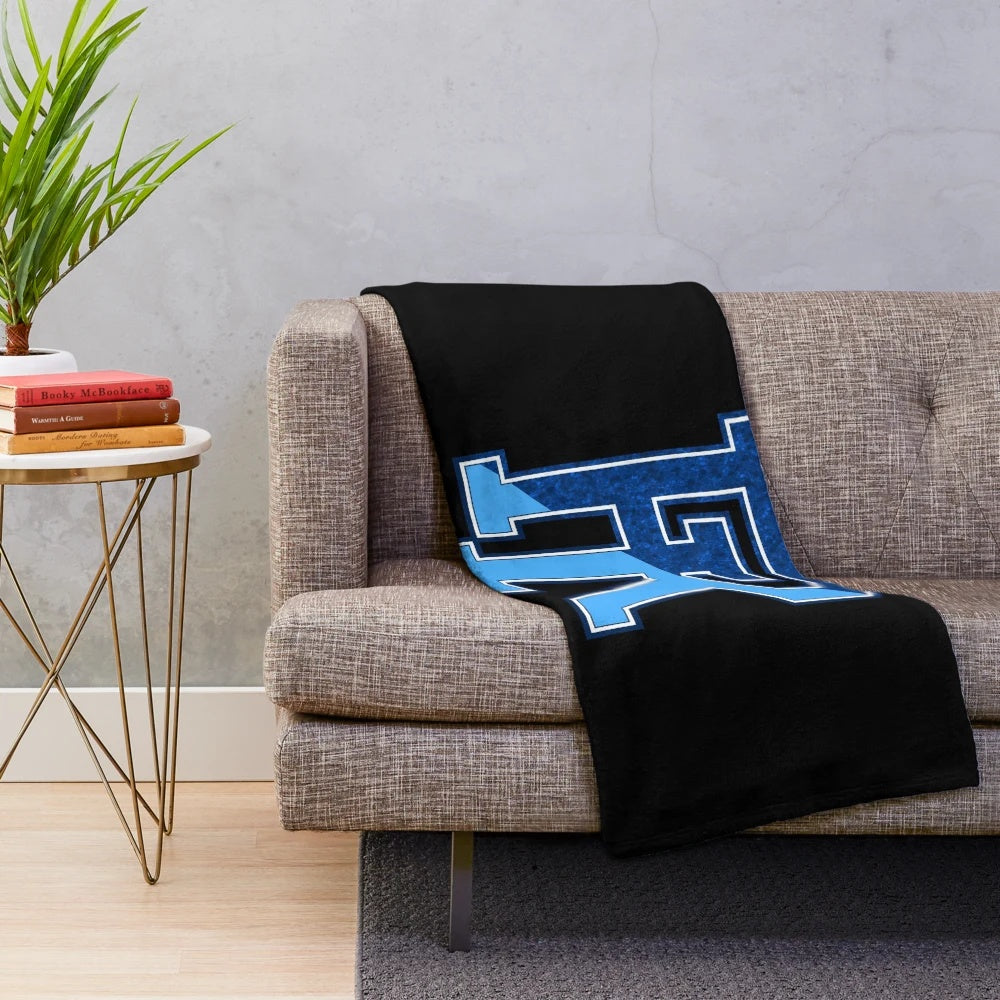 Plush blanket featuring the University of Rhode Island Rhody Rams logo