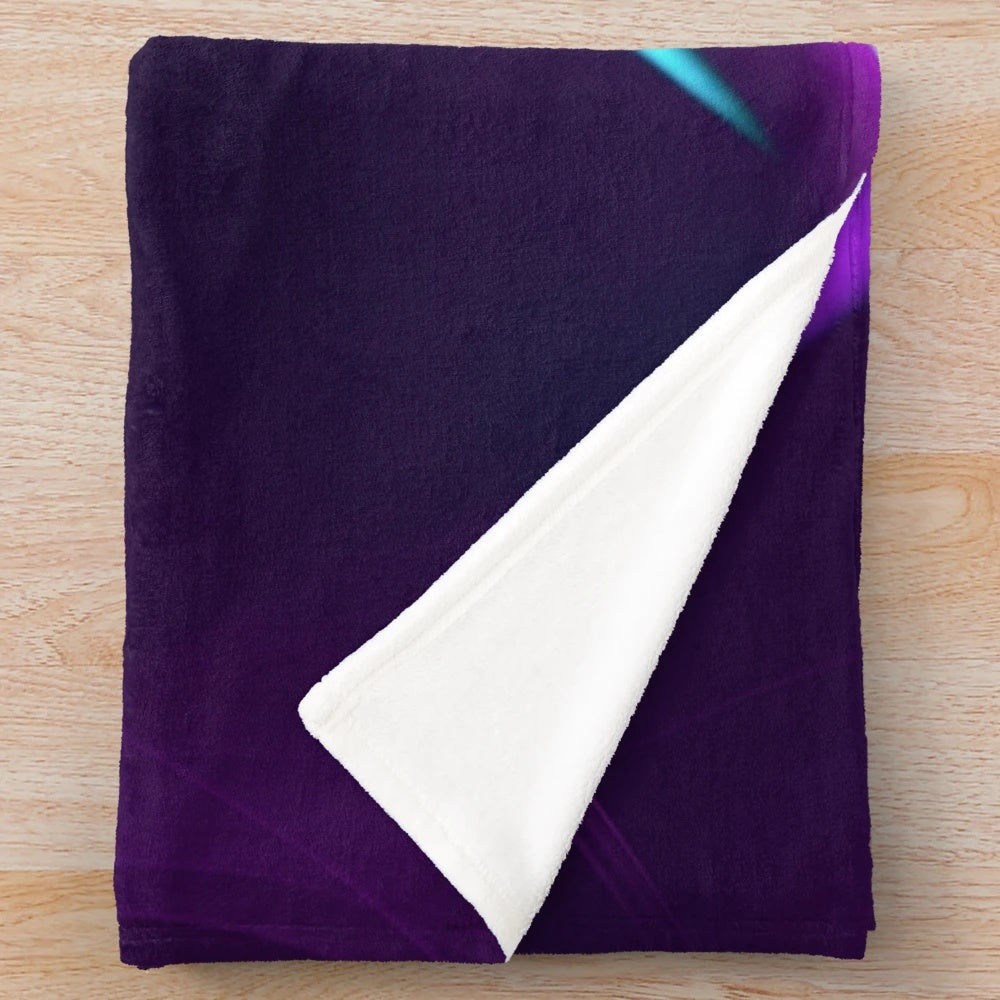 Soft and plush blanket with a swirling teal and purple pattern