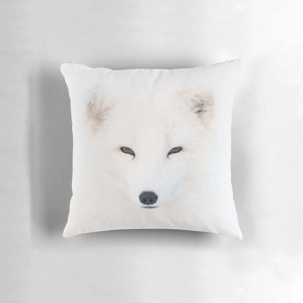 Soft and plush pillow featuring the fluffy winter coat of a polar fox, perfect for wildlife photography fans