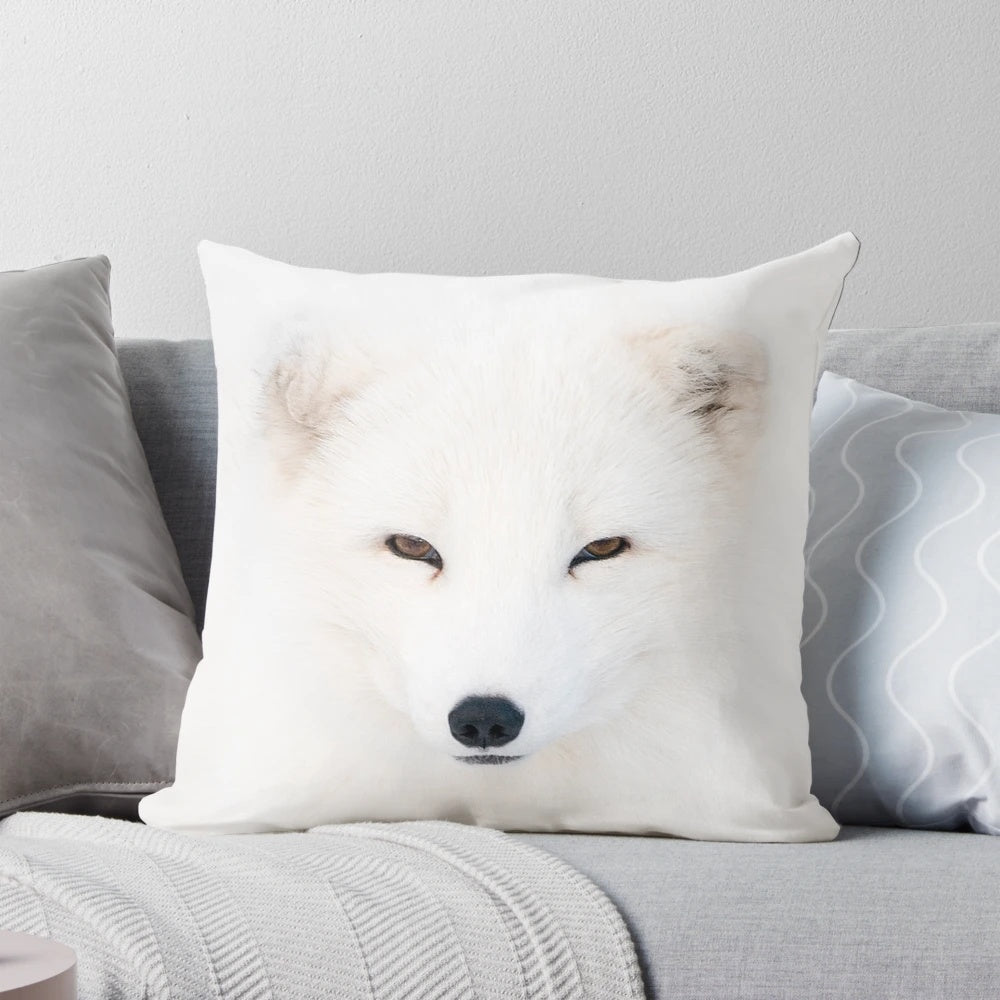 Soft and plush pillow featuring the fluffy winter coat of a polar fox, perfect for wildlife photography fans
