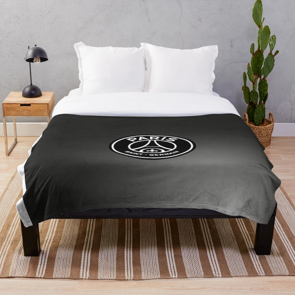 Plush black and white PSG-themed blanket