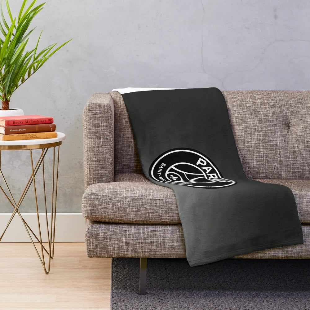 Plush black and white PSG-themed blanket