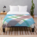 Scottish tartan plush blanket in blue, green, and white