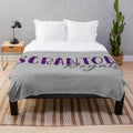 Scranton Royals plush blanket featuring the university's team colors and logo