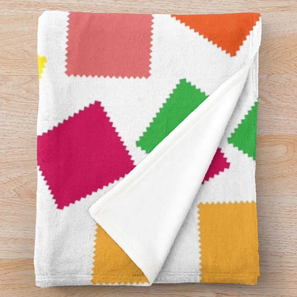 Soft and cozy plush blanket with a seamless patchwork design