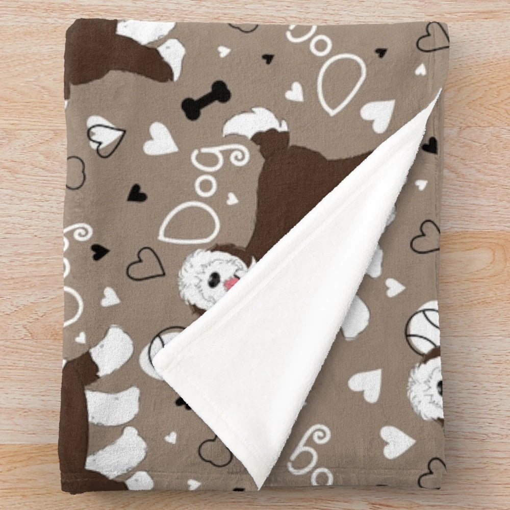 Chocolate brown and white sheepadoodle dog plush blanket