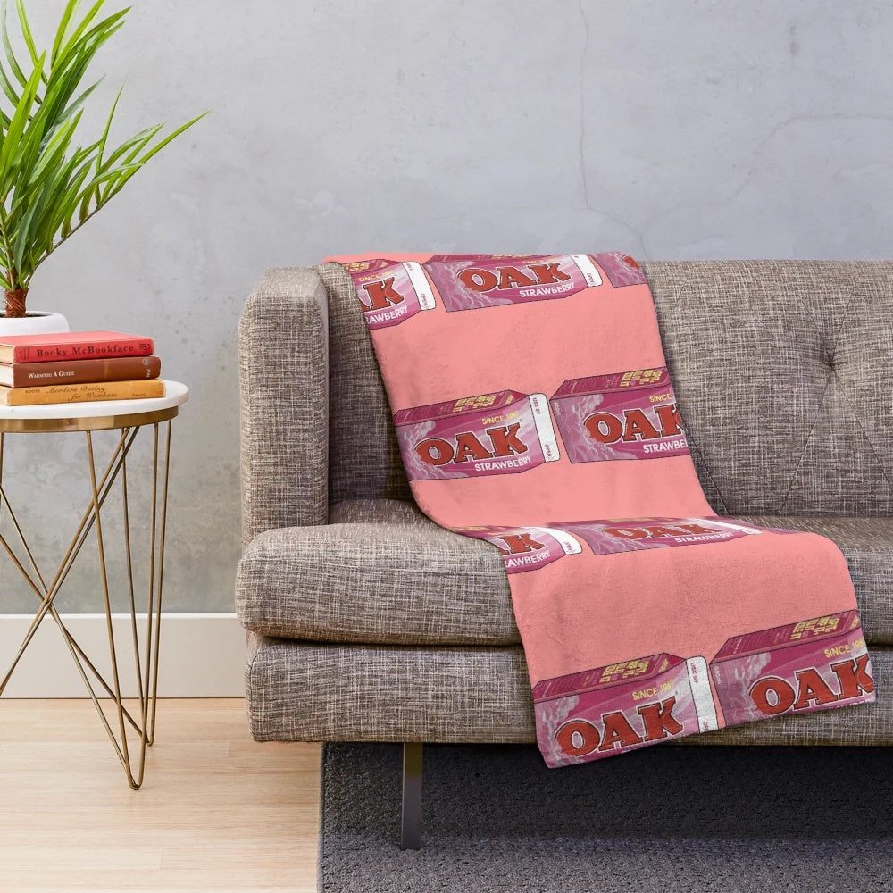 Soft and cozy strawberry milk-themed plush blanket with a pastel aesthetic design