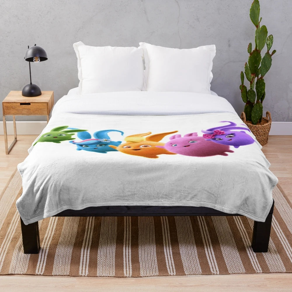 Soft and cuddly plush blanket featuring the lovable Sunny Bunnies characters