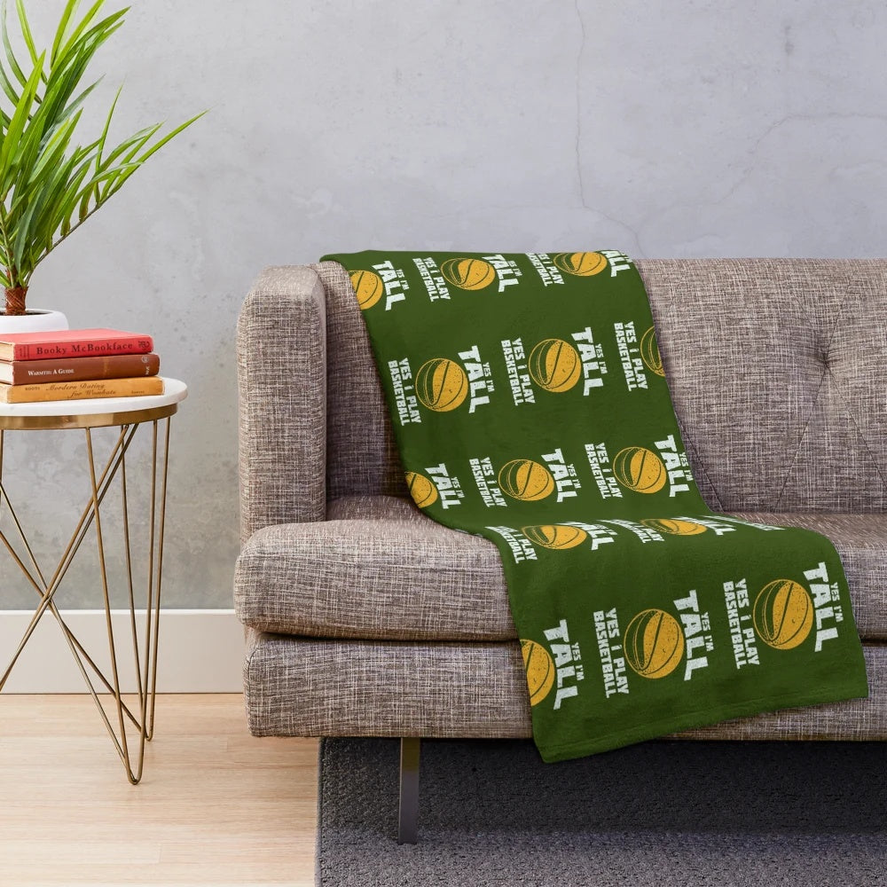 Plush blanket with "Yes I'm Tall, Yes I Play Basketball" design