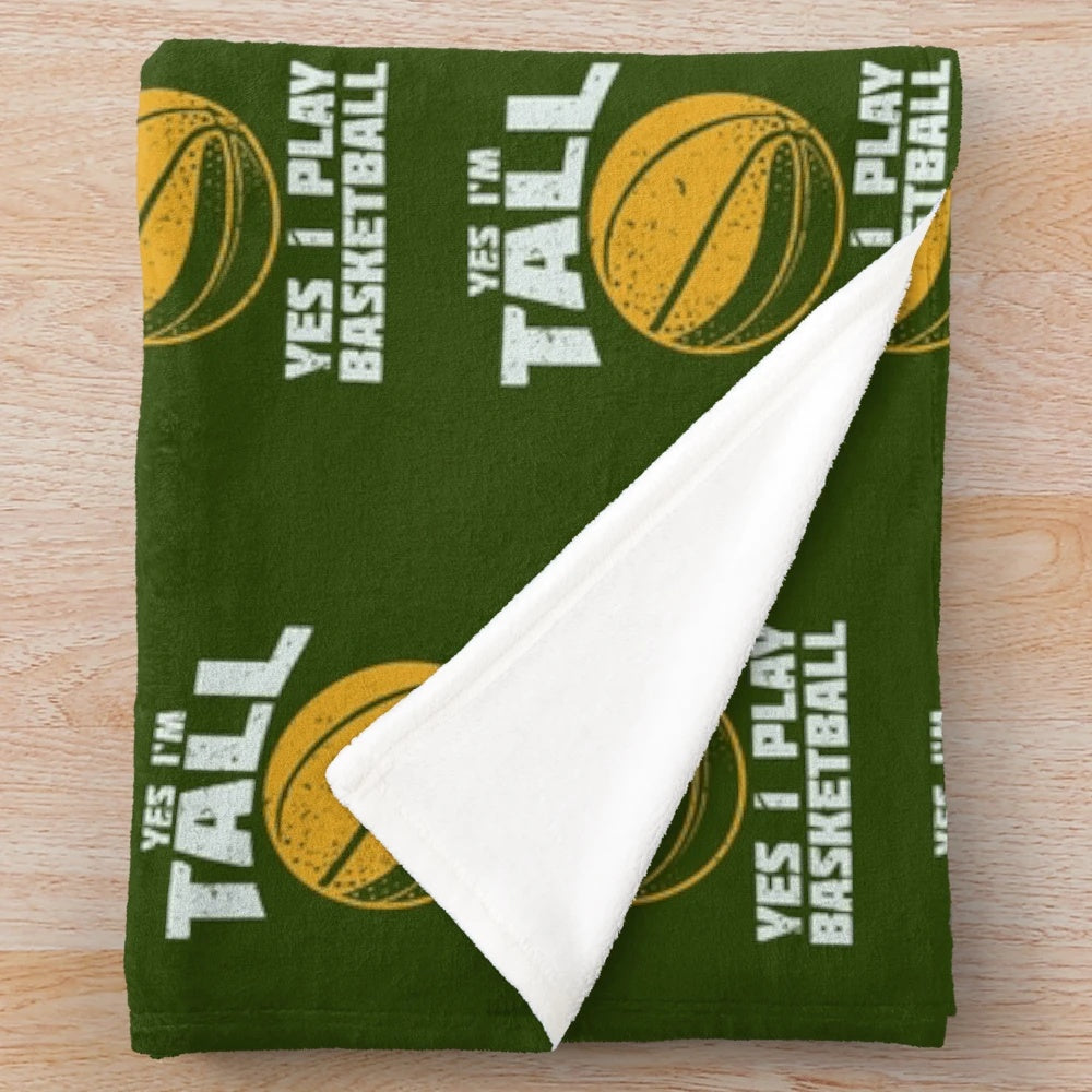 Plush blanket with "Yes I'm Tall, Yes I Play Basketball" design