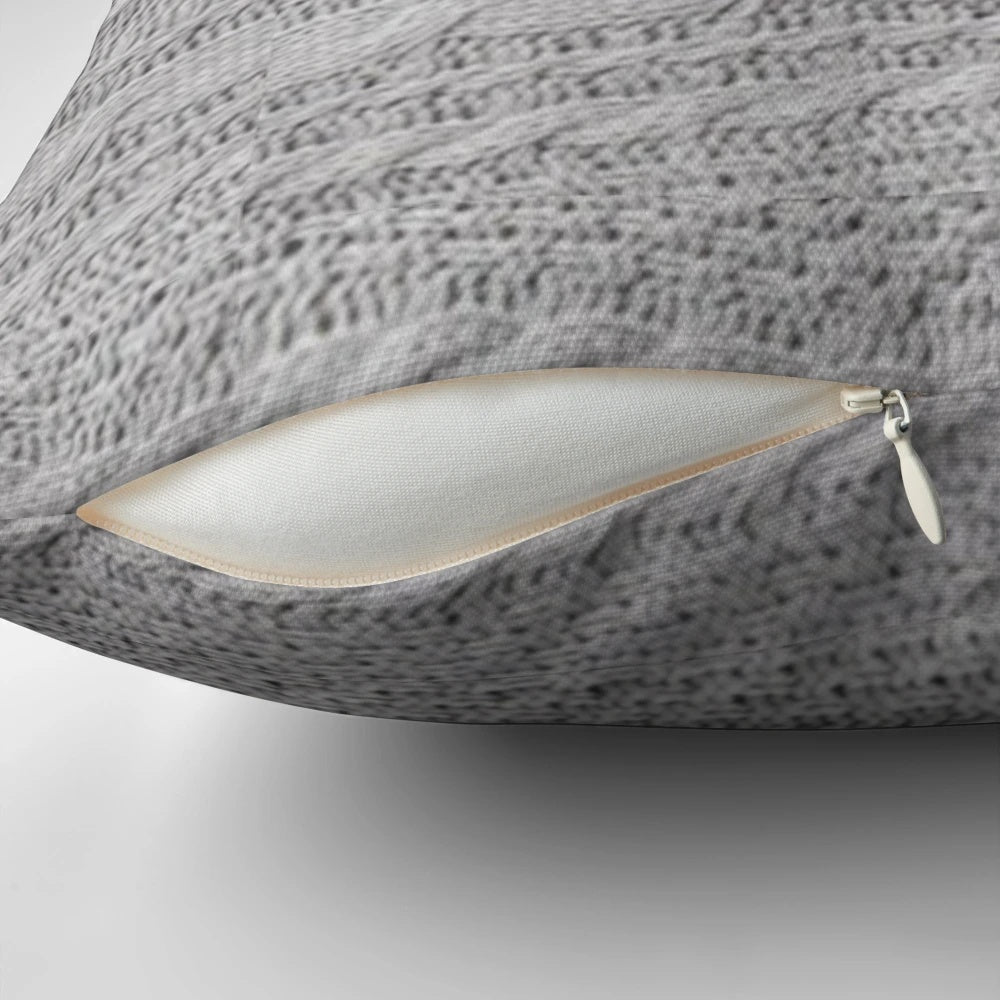A stylish and comfy pillow featuring Taylor Swift's iconic 'cardigan' design