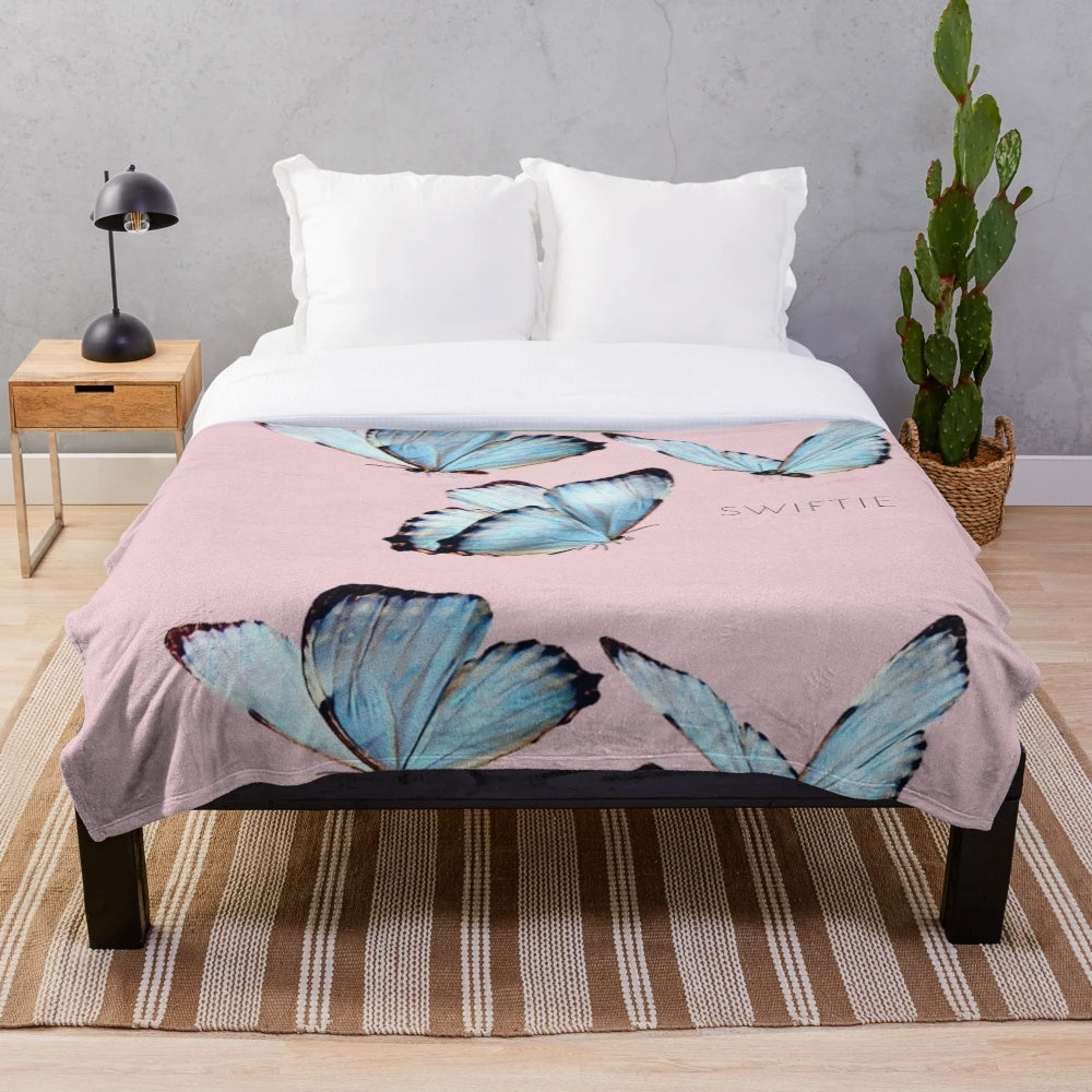 Soft and plush blue and pink butterfly-themed blanket inspired by Taylor Swift's Lover album
