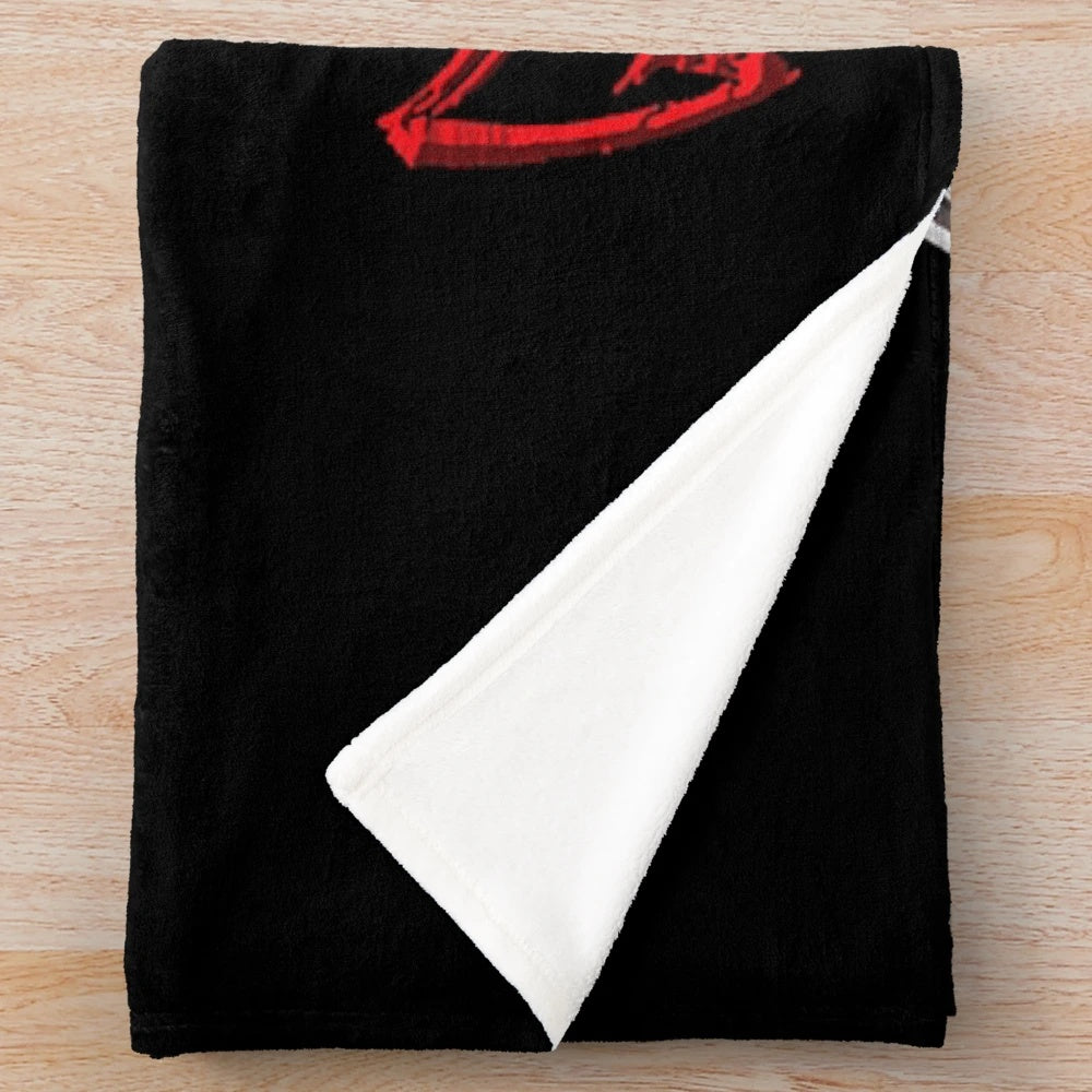 The Hu-inspired plush blanket featuring the band's iconic dragon logo and elements from the Genshin Impact game