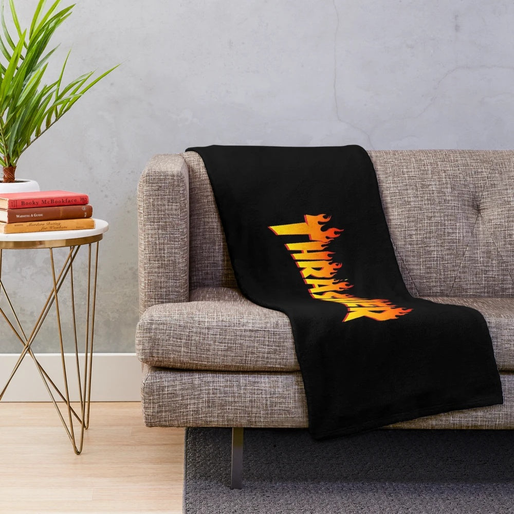 Trasher inspired plush blanket with flames design