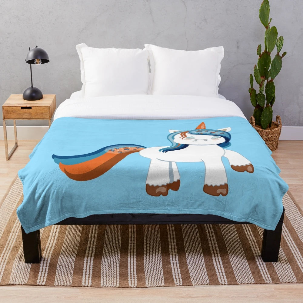 Soft and cuddly unicorn plush blanket in blue and orange colors