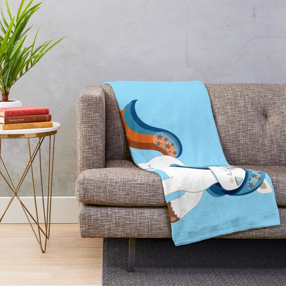 Soft and cuddly unicorn plush blanket in blue and orange colors