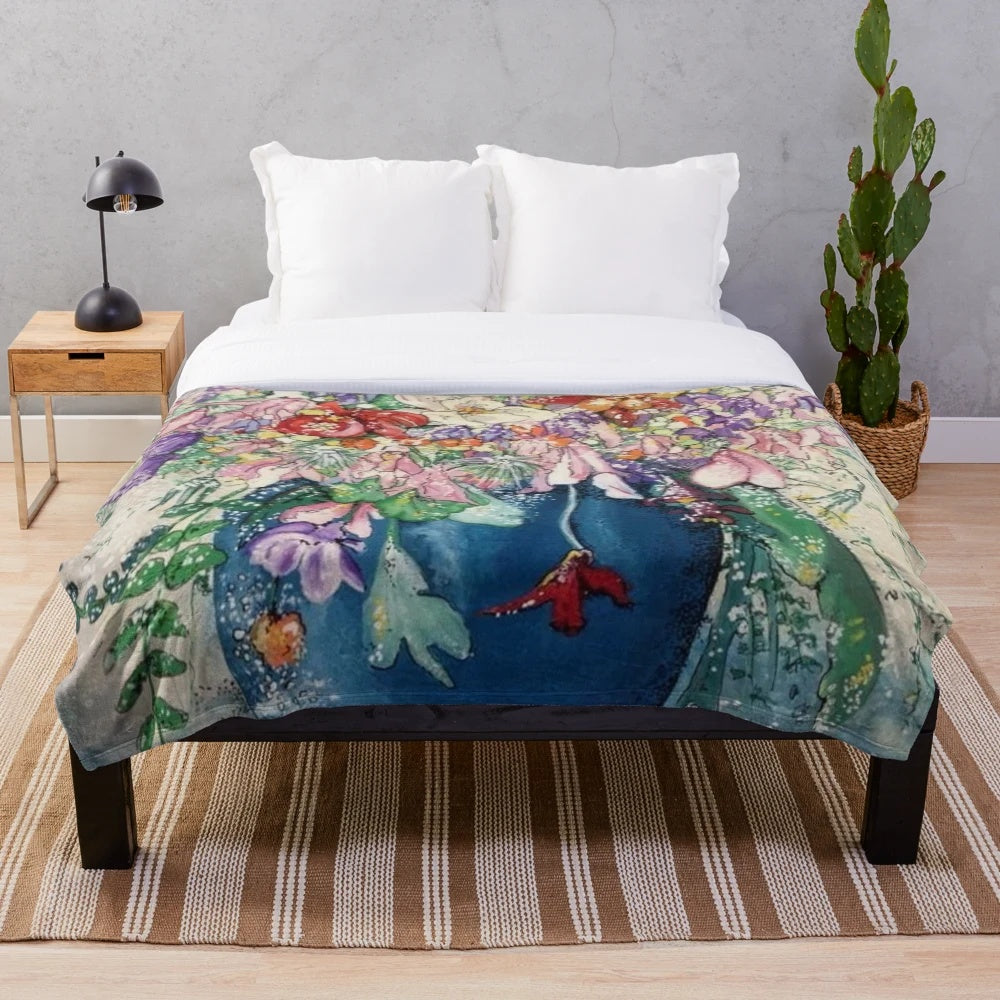 Vase of spring flowers plush blanket with a floral design