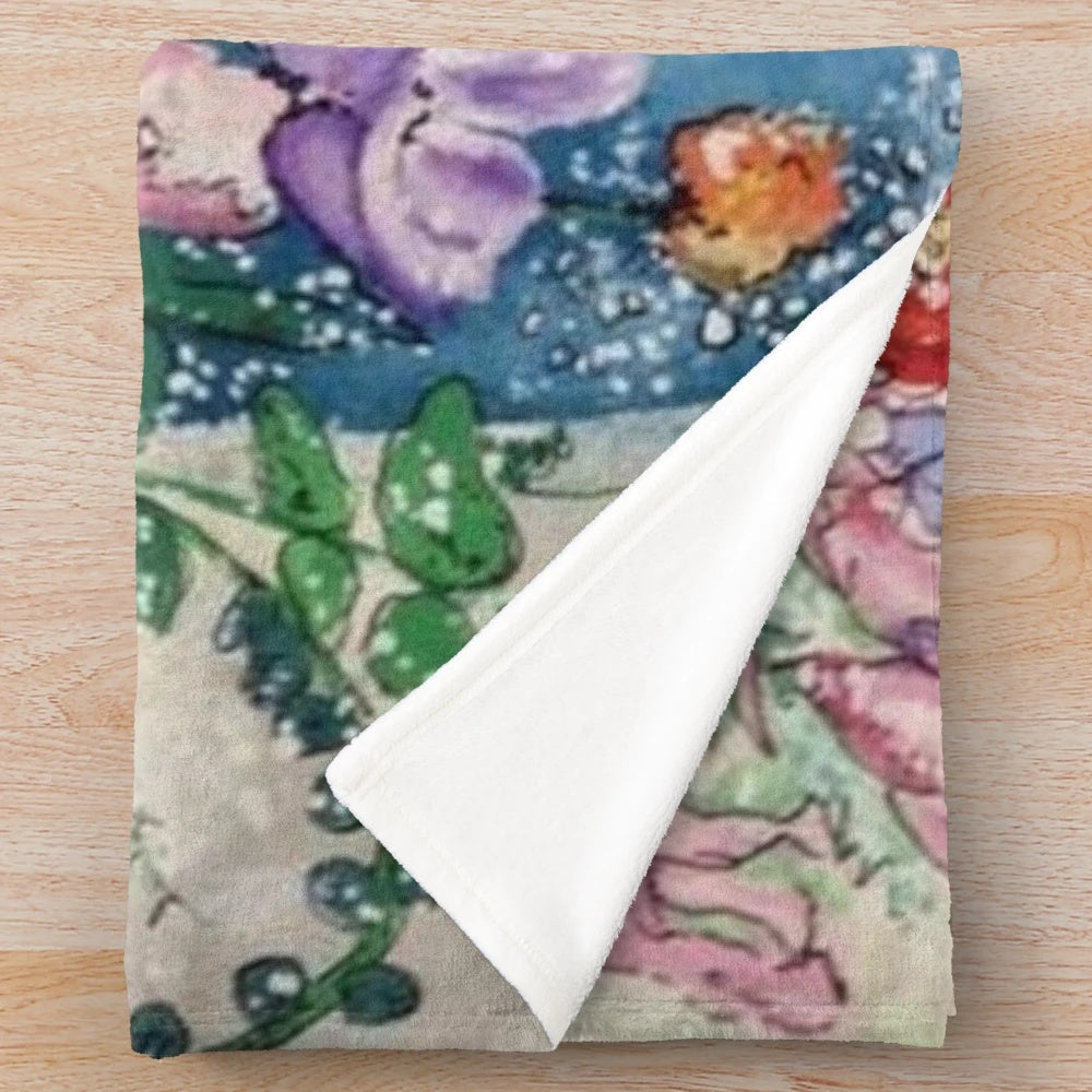 Vase of spring flowers plush blanket with a floral design