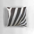 Soft and plush zebra print pillow for adding a touch of nature-inspired style to your home