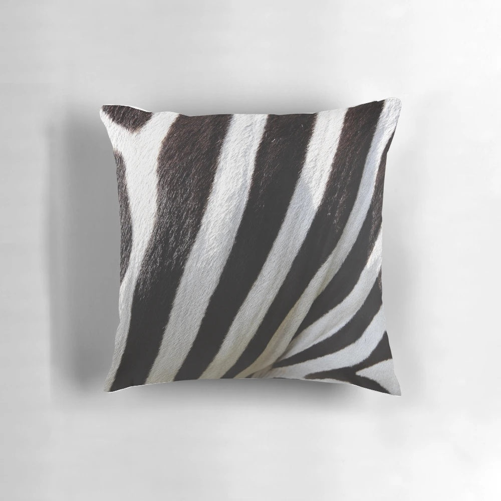 Soft and plush zebra print pillow for adding a touch of nature-inspired style to your home