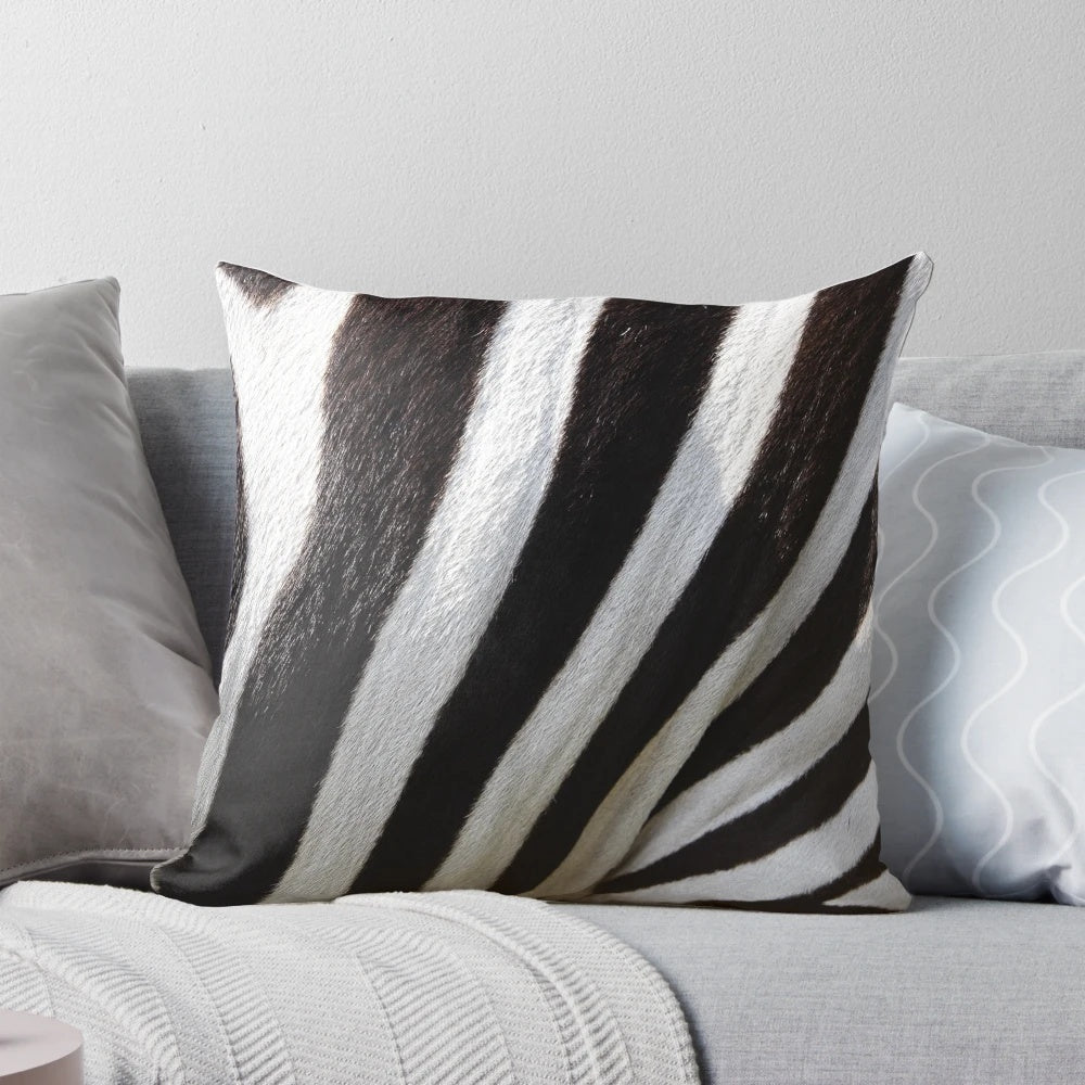 Soft and plush zebra print pillow for adding a touch of nature-inspired style to your home