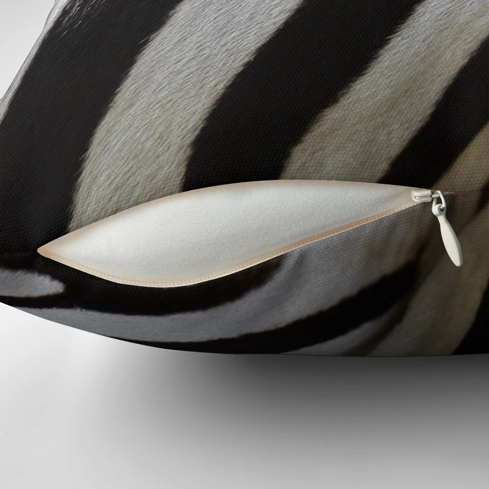 Soft and plush zebra print pillow for adding a touch of nature-inspired style to your home