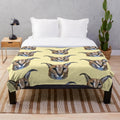 Big Floppa, a popular caracal meme cat, featured on a soft and cozy plush blanket
