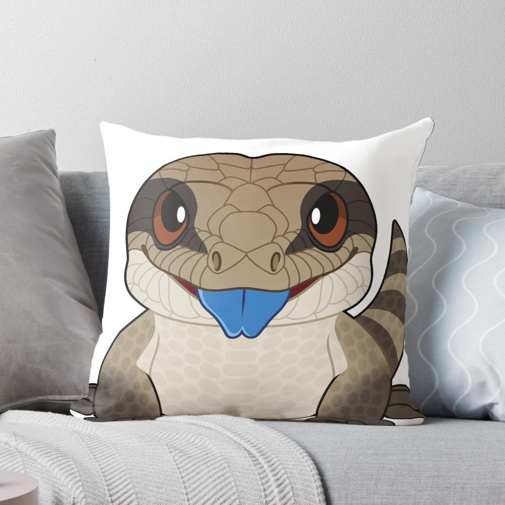 A soft and plush pillow featuring a detailed image of a blue tongue skink, a popular reptile pet.